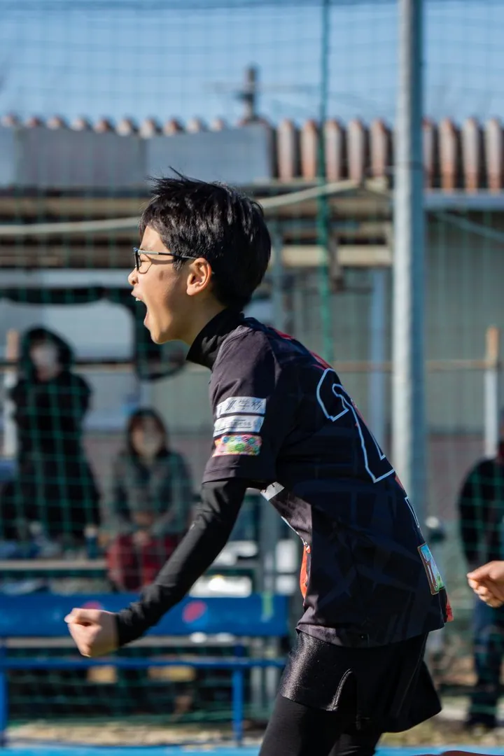 声をかける横山コーチ
